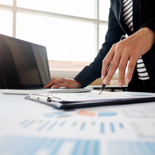 Administrator business man financial inspector and secretary making report calculating balance